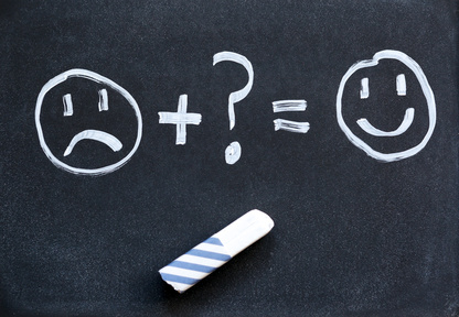 Equation written on a chalkboard with an unhappy smiley which becomes a happy smiley thanks to a magical missing item